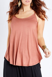 Model Laura wearing size 12 of the Softly Swinging Bamboo Scoop Singlet in colour Copper, from the front, cropped image