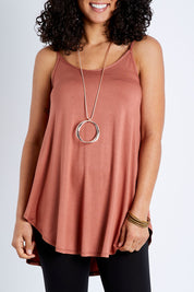Model Pamela wearing the Softly Swinging Bamboo Scoop Singlet in colour Copper, from the front, cropped image