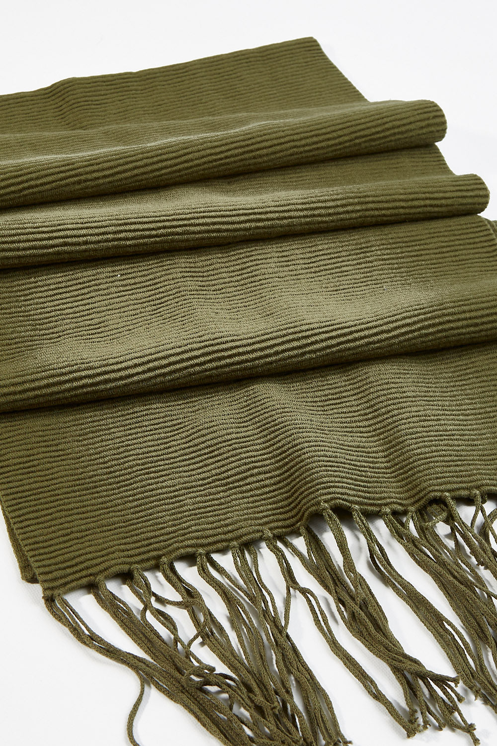 A model wearing size OneSize of the All Wrapped Up Cotton Scarf in colour Khaki (Green), from the front, showing the whole outfit