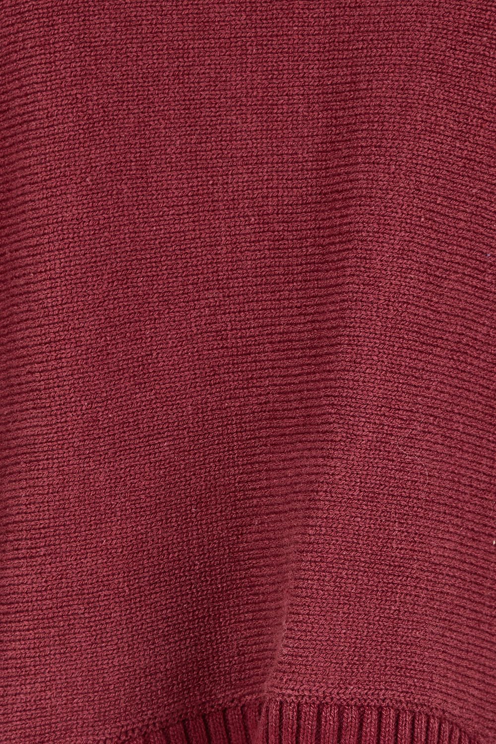Product shot of the Knit Pick Throw Sweater in colour Wine (Purple), detail