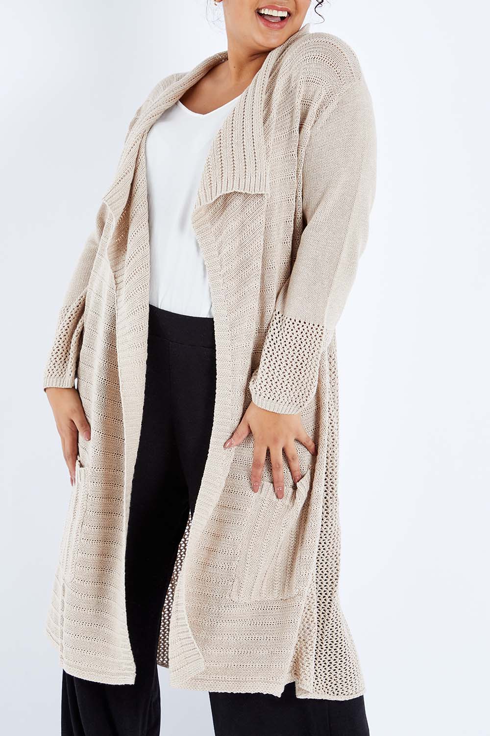 Model Sasha-Lee wearing size XL of the Starlit Night Cotton Cardi in colour Latte, from the front, cropped image