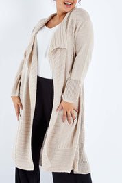 Model Sasha-Lee wearing size XL of the Starlit Night Cotton Cardi in colour Latte, from the front, cropped image
