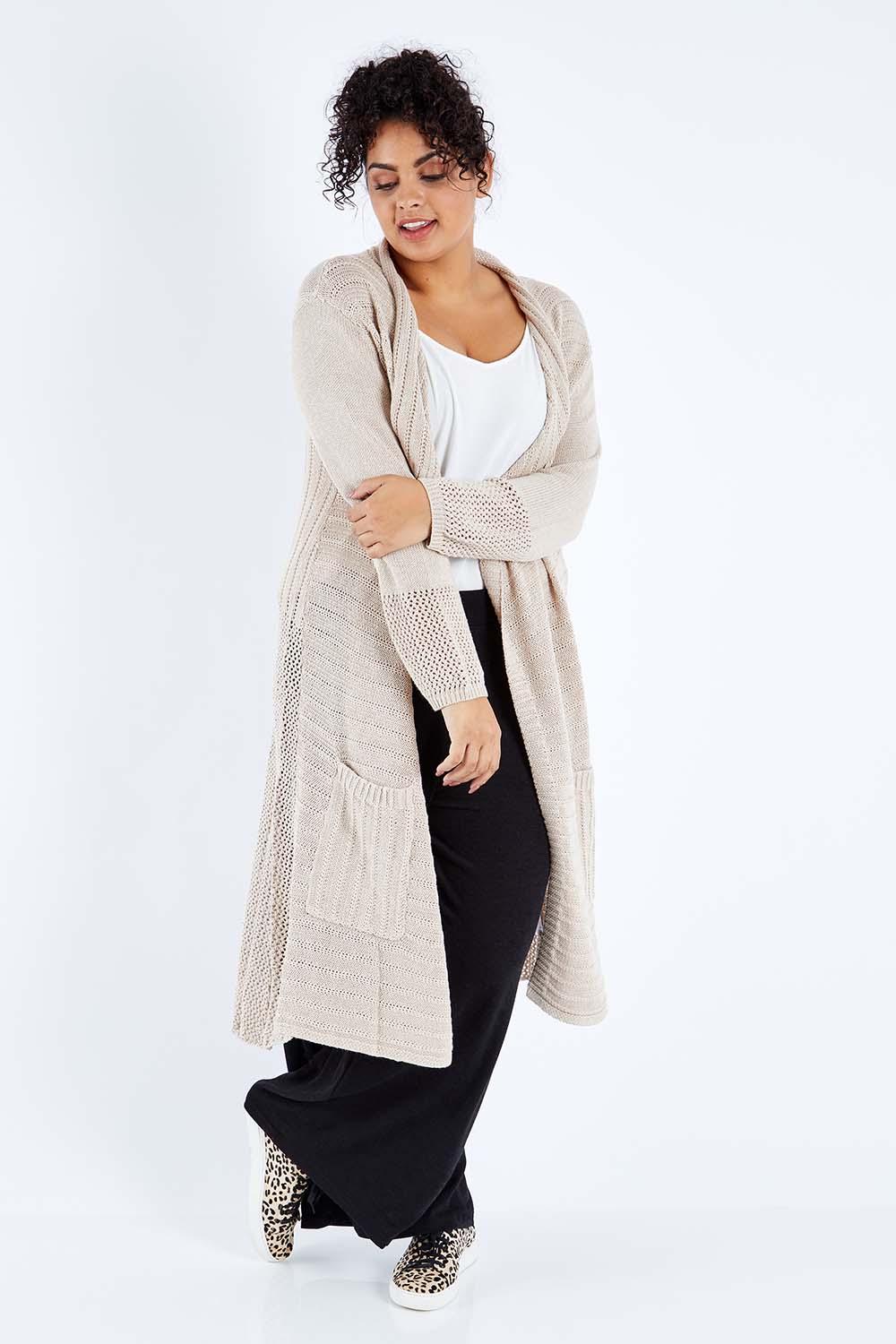 Model Sasha-Lee wearing size XL of the Starlit Night Cotton Cardi in colour Latte, from the front, showing the whole outfit