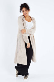 Model Sasha-Lee wearing size XL of the Starlit Night Cotton Cardi in colour Latte, from the front, showing the whole outfit