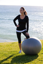 A model wearing size S of the Long Sleeve Tee in colour Black (Black), from the front, showing the whole outfit