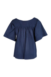 Product shot of the Freya Top in colour Navy (Blue), from the back