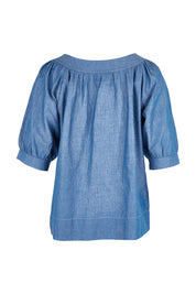 Product shot of the Bliss Top in colour Chambray (Blue), from the back