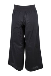 Product shot of the Ria Pant in colour Black (Black), from the back