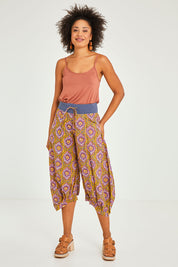 Model Olivia wearing size 10 of the Guru Pant in colour Amaira, from the front, showing the whole outfit