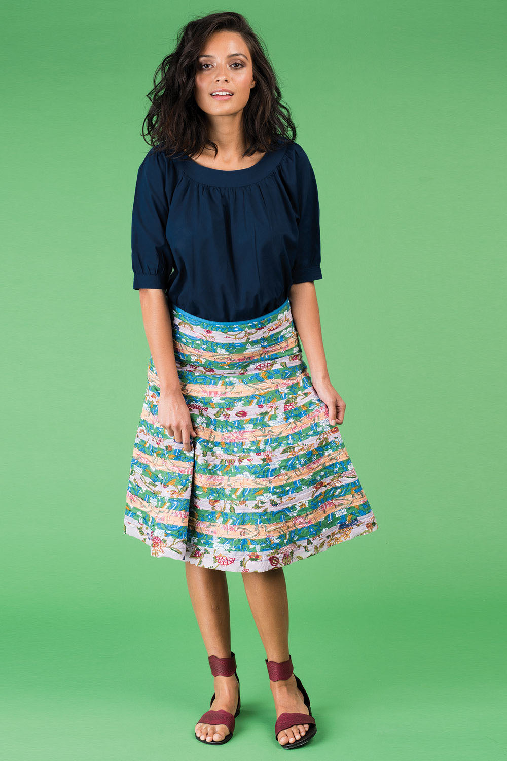 A model wearing the Bliss Top Basics in colour BlueBasic (Blue), from the front, showing the whole outfit