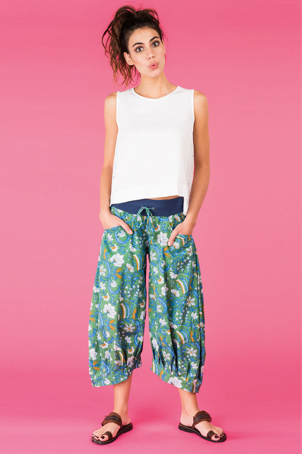 A model wearing the Printed Guru Pants in colour BlockGreen (Green), from the front, showing the whole outfit