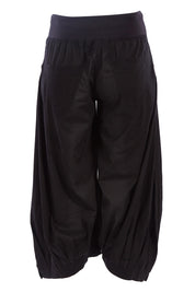 Product shot of the Guru Pant in colour Black (Black), from the back