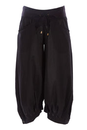 Product shot of the Guru Pant in colour Black (Black), from the front