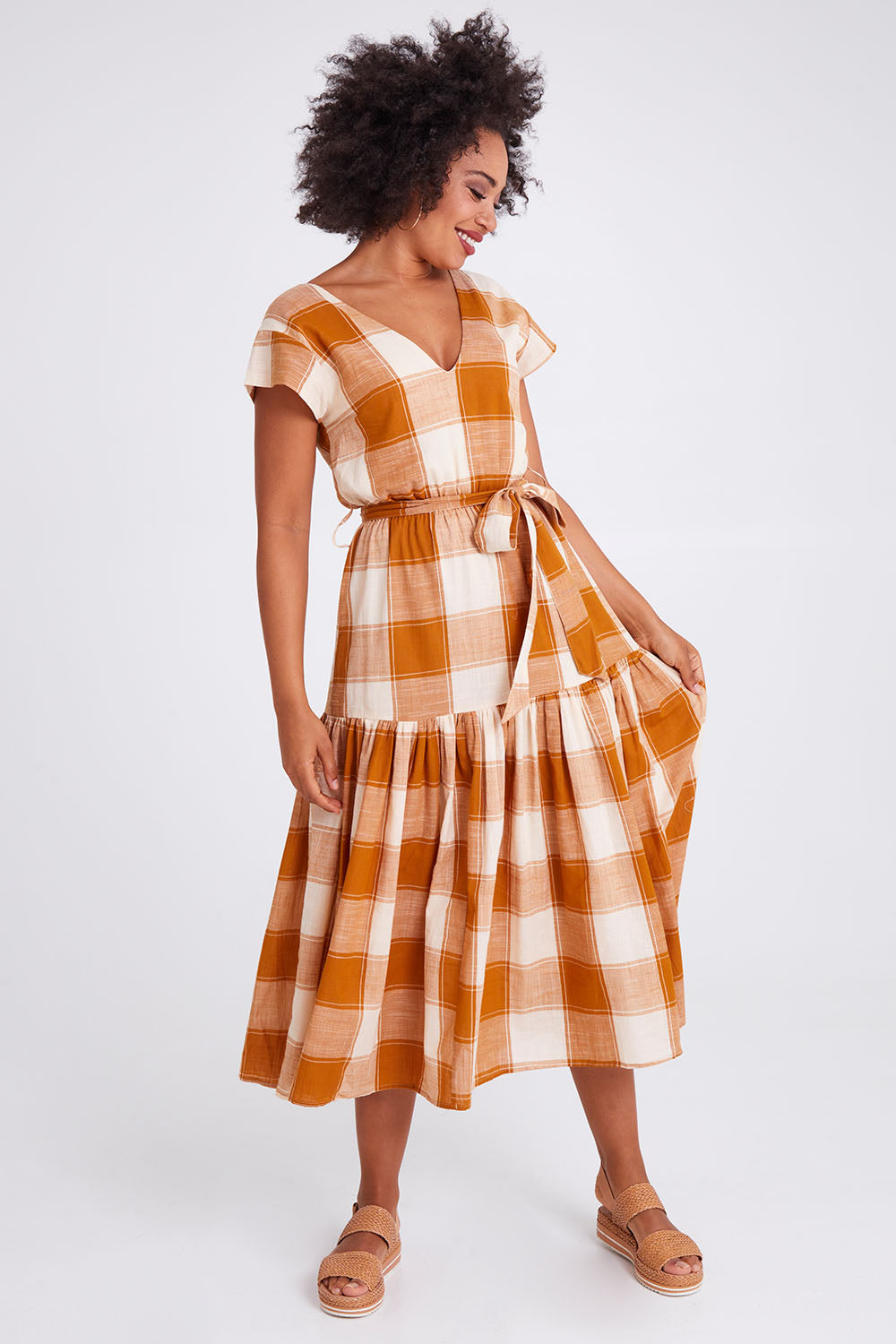 Model Olivia wearing size 10 of the Indy Dress in colour Gingerchec, from the front, showing the whole outfit