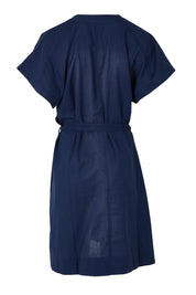 Product shot of the Livy Cotton Dress in colour Navy (Blue), from the back