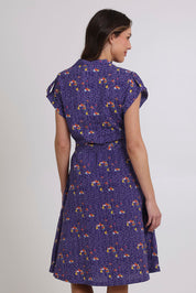 Model Madeline wearing size 10 of the Amalfi Cotton Dress in colour Amalfi (Blue), from the back