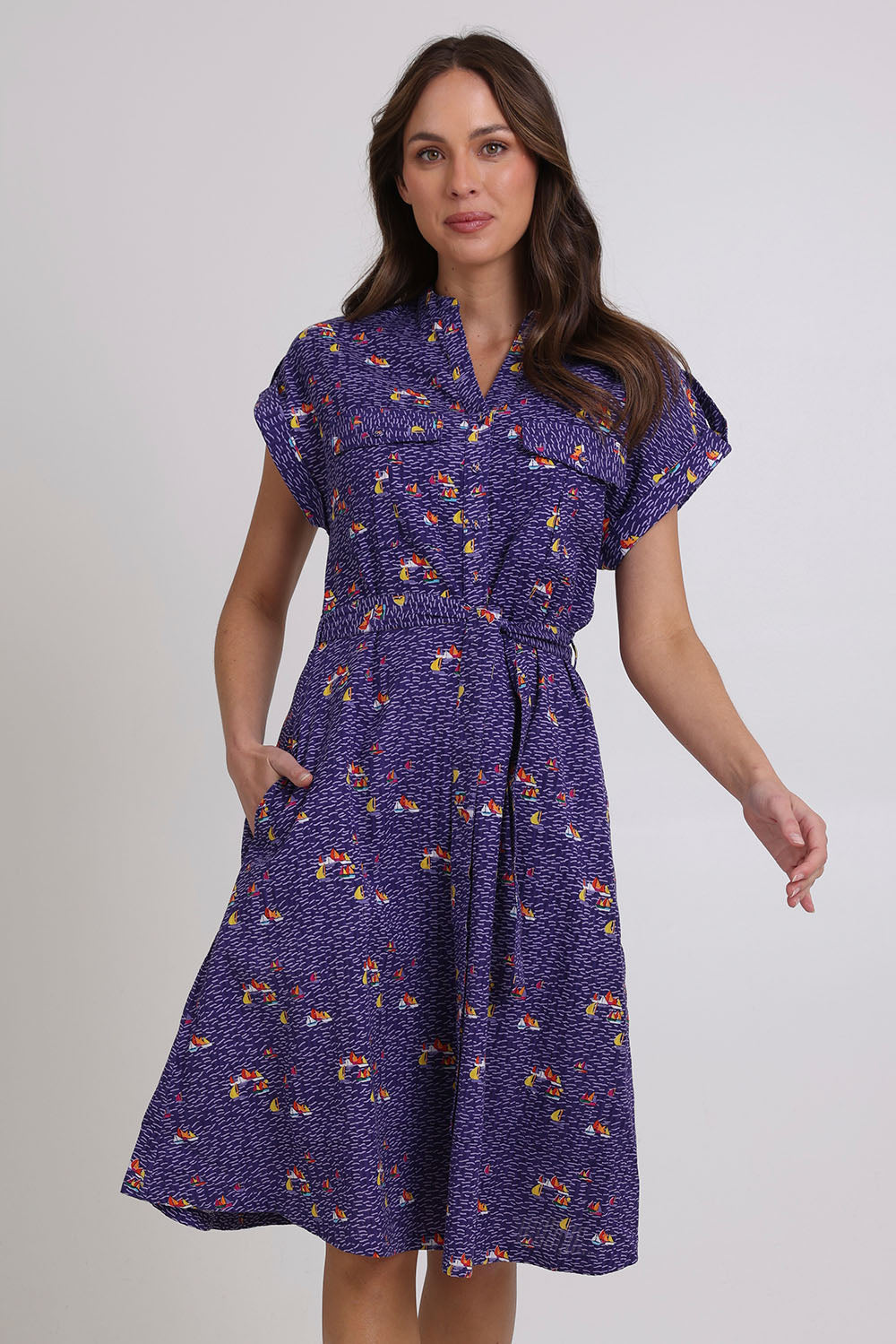 Model Madeline wearing size 10 of the Amalfi Cotton Dress in colour Amalfi (Blue), from the front, cropped image