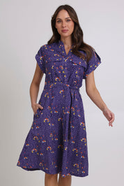 Model Madeline wearing size 10 of the Amalfi Cotton Dress in colour Amalfi (Blue), from the front, cropped image