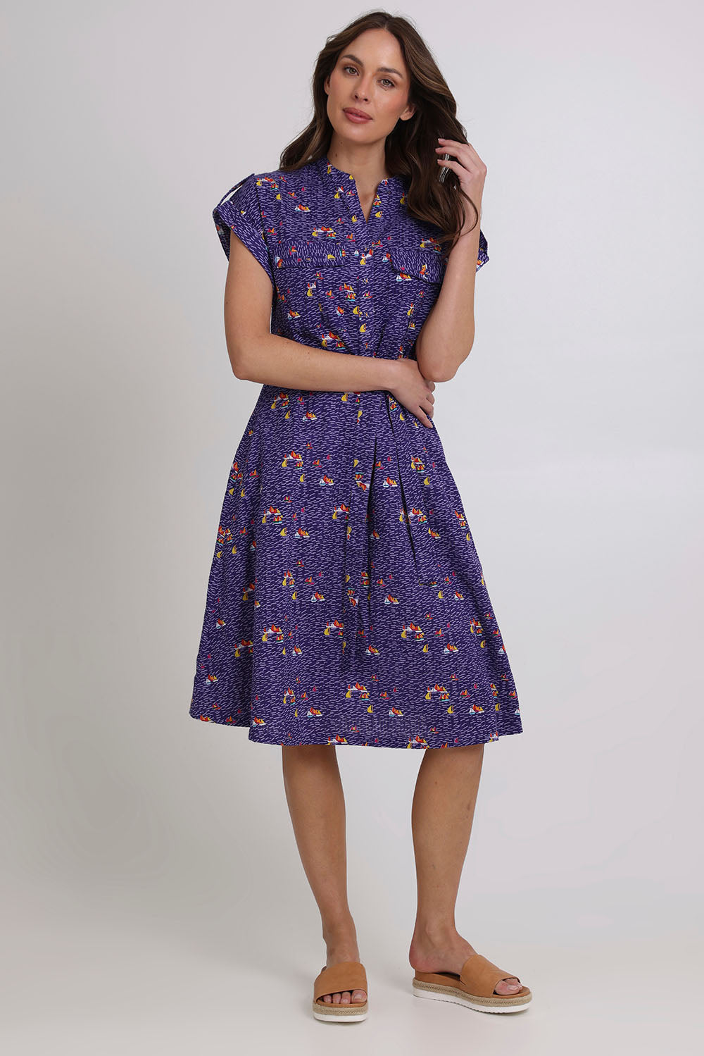 Model Madeline wearing size 10 of the Amalfi Cotton Dress in colour Amalfi (Blue), from the front, showing the whole outfit