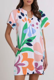 Model Madeline wearing size 10 of the Etta Cotton Dress in colour Sorrento, from the front, cropped image
