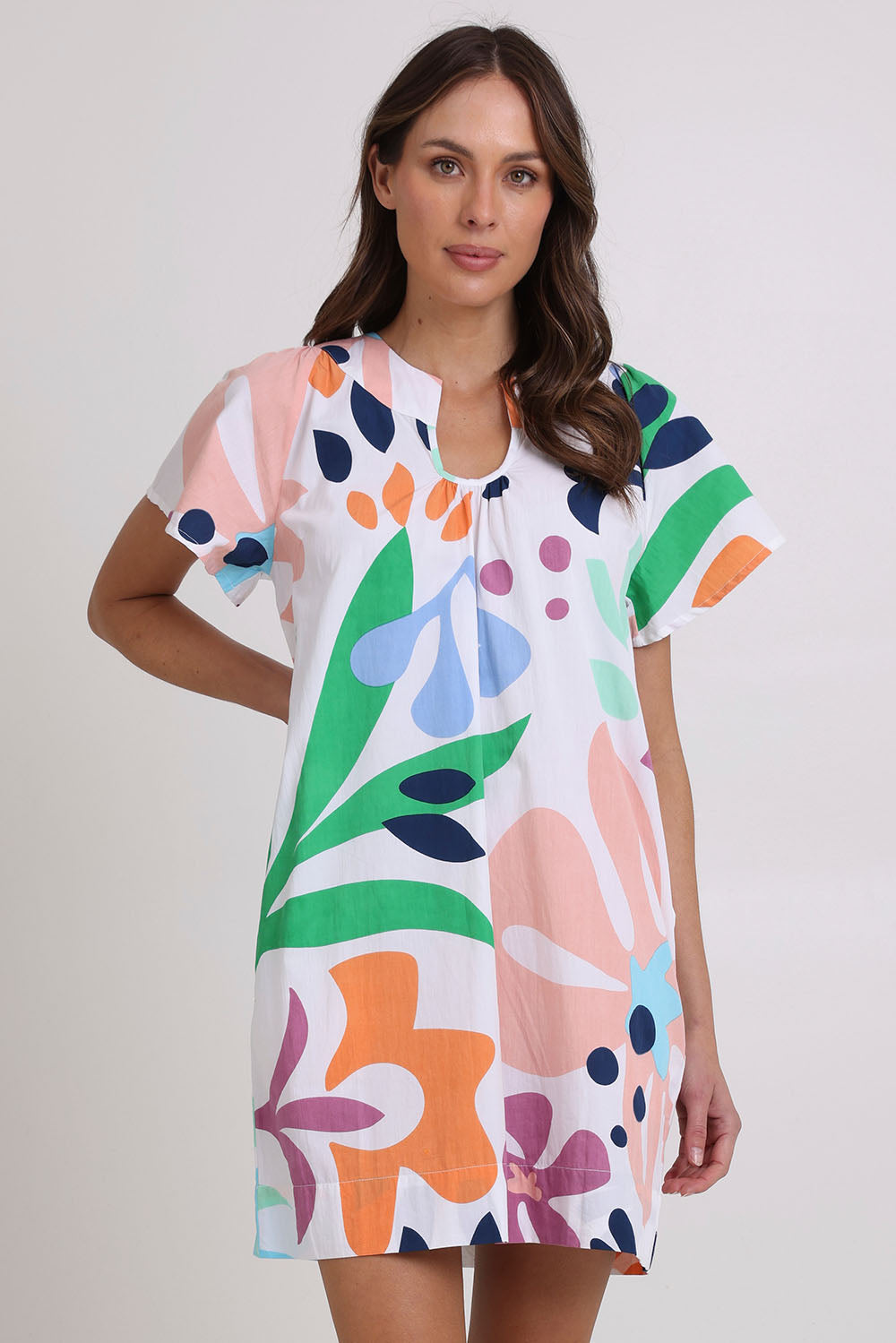 Model Madeline wearing size 10 of the Etta Cotton Dress in colour Sorrento, from the front, cropped image