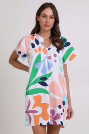 Model Madeline wearing size 10 of the Etta Cotton Dress in colour Sorrento, from the front, cropped image
