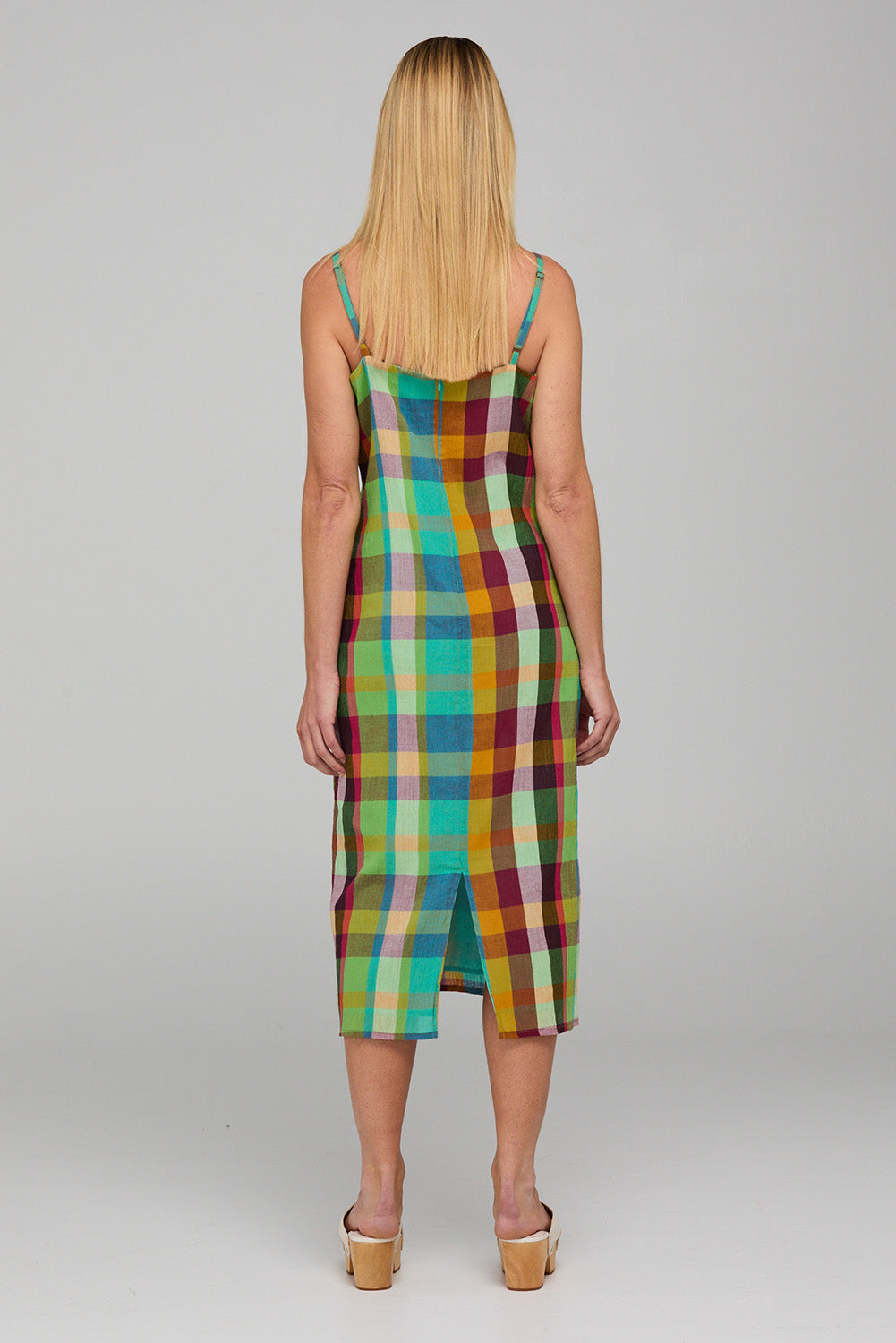 A model wearing the Ophelia Cotton Dress in colour Isabella, from the back