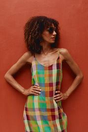 A model wearing the Ophelia Cotton Dress in colour Isabella, from the front, cropped image