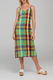 A model wearing the Ophelia Cotton Dress in colour Isabella, from the front, cropped image