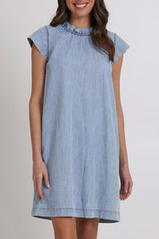 Model Madeline wearing size 10 of the Sand Lyocell Dress in colour Comoda (Blue), from the front, cropped image