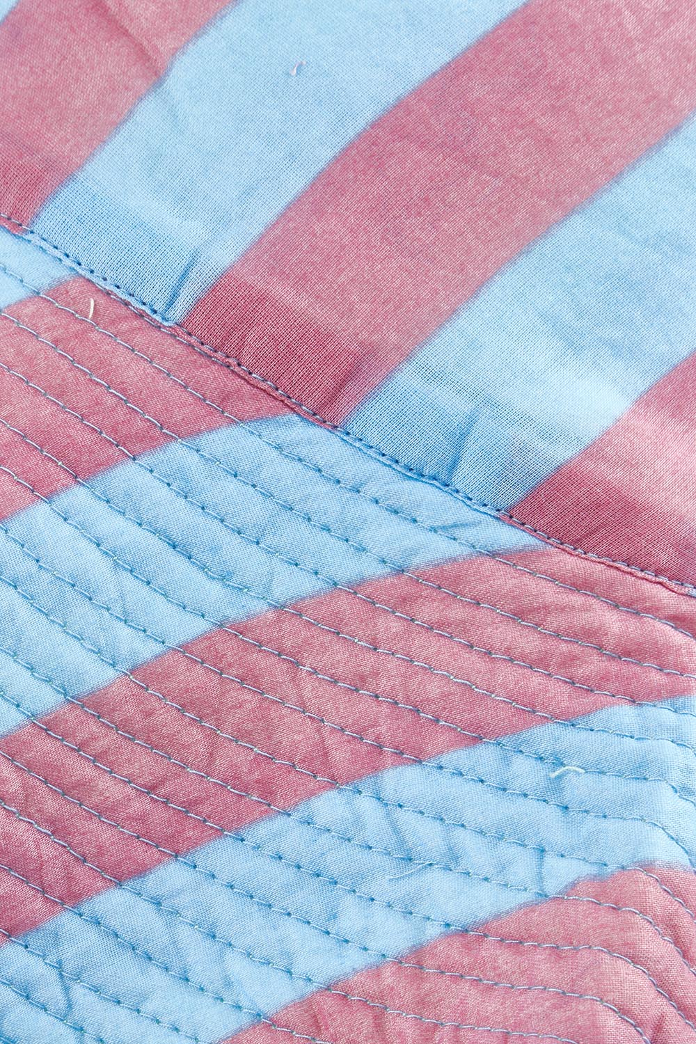 Product shot of the Fray Cotton Bucket Hat in colour Capriblue, detail