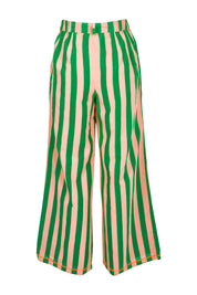 Product shot of the Sana Cotton Pant in colour Capri (Green), from the back