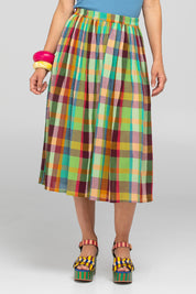 A model wearing the Sami Cotton Skirt in colour Isabella, from the front, cropped image