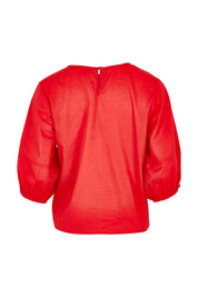 Product shot of the Ava Cotton Top in colour Pomodoro (Red), from the back