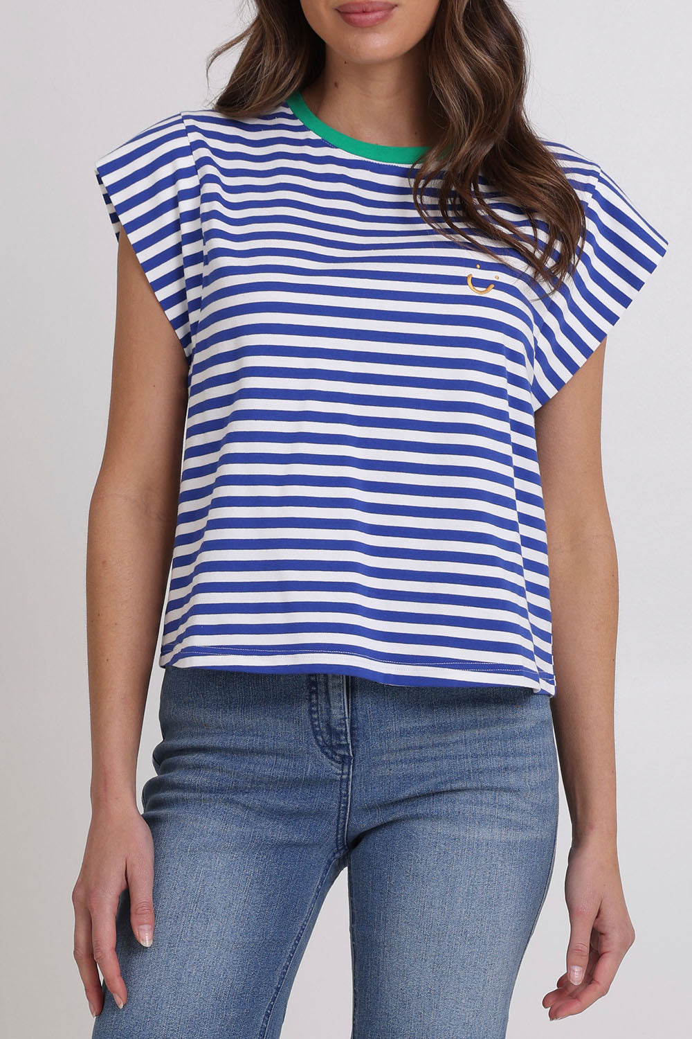 Model Madeline wearing size S of the Bellissimo Cotton Tee in colour Bluestripe (Blue), from the front, cropped image