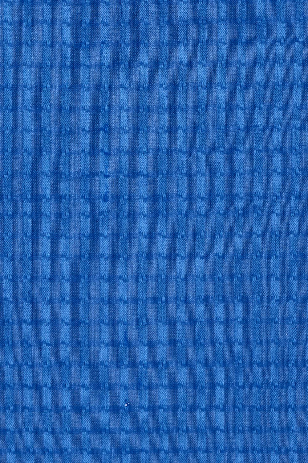 Product shot of the Leaf Cotton Top in colour Blu (Blue), detail