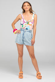 A model wearing the Juno Cotton Top in colour Sorrento, from the front, showing the whole outfit