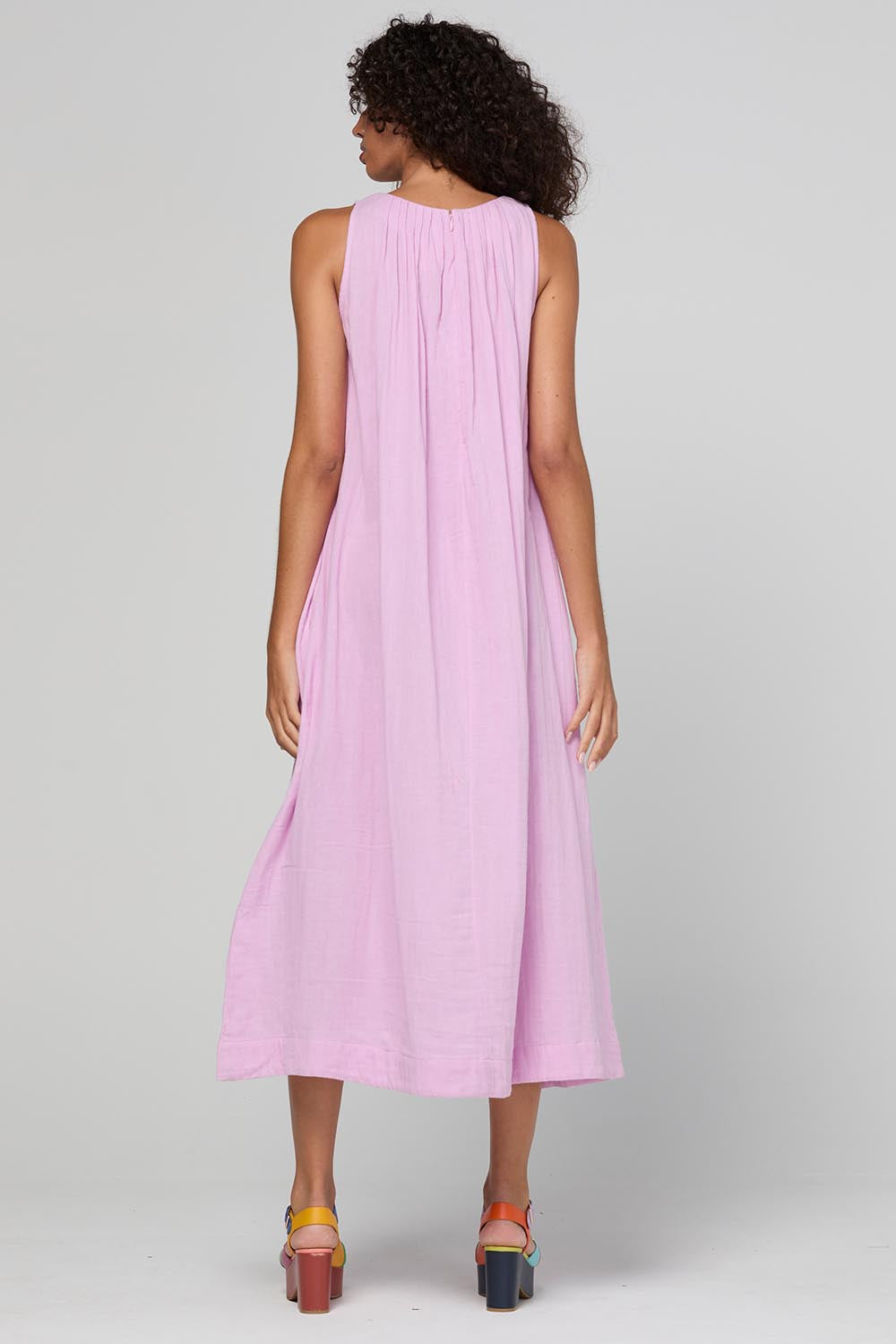 Model Genericm wearing size sample of the Oceano Dress – Sorbet in colour Sorbet, from the front