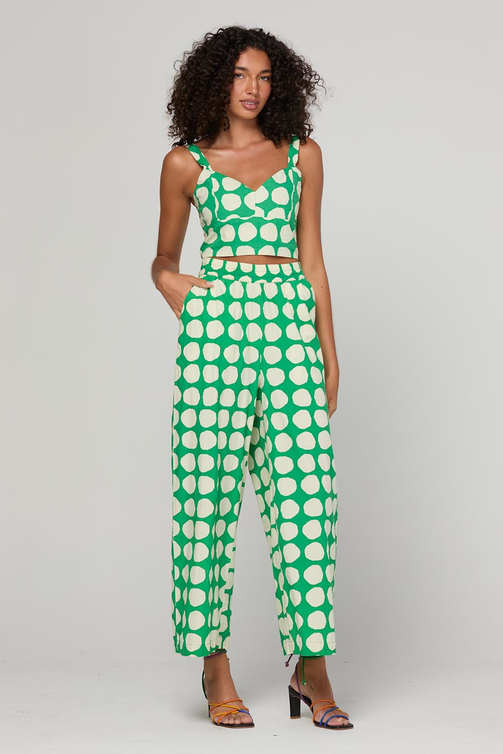 Model Genericm wearing size sample of the Carmen Pant - Circulo in colour Circulo, from the front