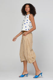 Model Genericm wearing size sample of the Guru Pant – Mustard in colour Mustard, from the front