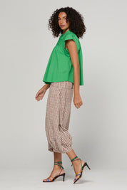 Model Genericm wearing size sample of the Guru Pant – Cocoa in colour Cocoa, from the front