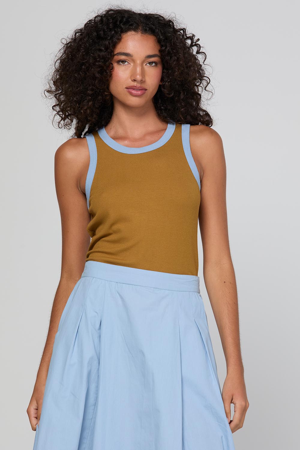 Model Genericm wearing size sample of the Bellissimo Tank – Icedchai in colour Icedchai, in a cropped view
