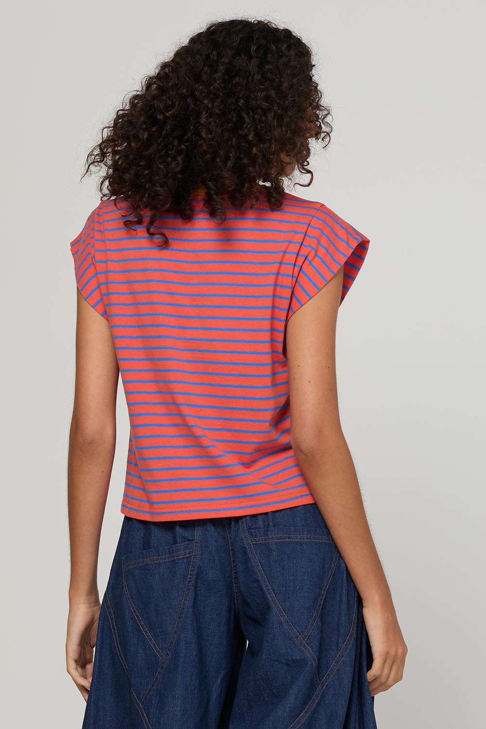Model Genericm wearing size sample of the Bellissimo Tee – Roma in colour Roma, from the back