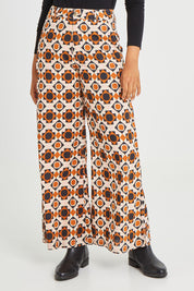 Model Olivia wearing size 10 of the Grand Flare in colour Cascia, from the front, cropped image
