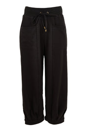 Product shot of the Guru Cotton Blend Track in colour Black (Black), from the front