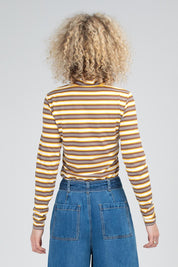A model wearing the Stripe Cotton Skivvy in colour Stripe, from the back