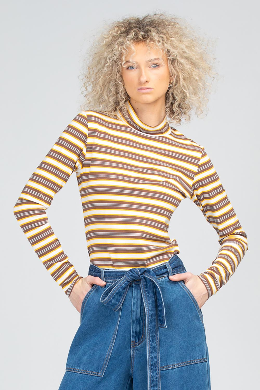 A model wearing the Stripe Cotton Skivvy in colour Stripe, from the front, cropped image