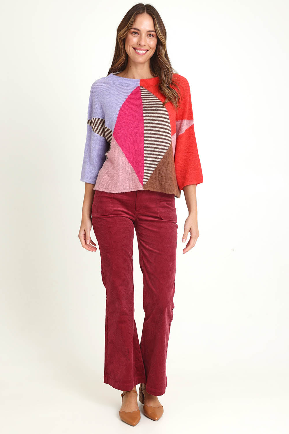 Model Madeline wearing size S of the Neopolitan Jumper in colour Multi, from the front, showing the whole outfit