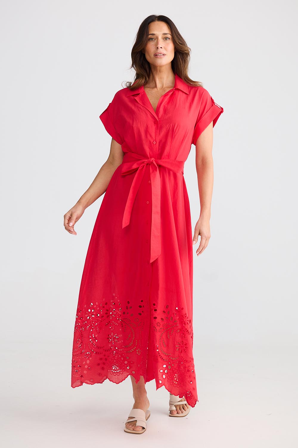 A model wearing the Versailles Cotton Dress in colour Chilli (Red), from the front, showing the whole outfit