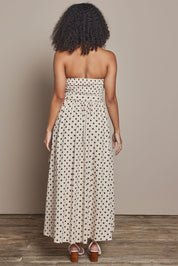 Model Ziara wearing size S of the Avalon Cotton Maxi Dress in colour Chocpolka, from the back